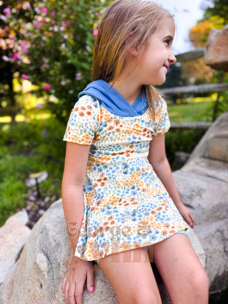 Grow With Me Hooded Hi-Low Wildflowers Peplum – Short Sleeve